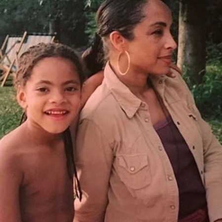 Sade Adu with Mickailia "Ila" Adu.
